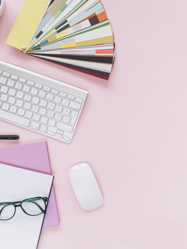 lavender-cellphone-keyboard-mouse-with-office-stationery-colored-pink-background